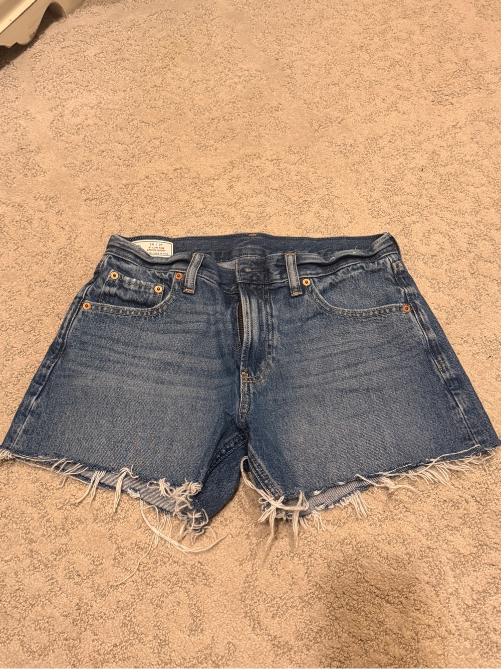 Low-Rise Stride Denim Cutoff Shorts- 4 inch